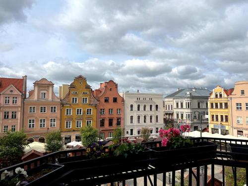 a view of a city with colorful buildings at Long Island in Grudziądz