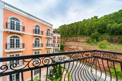 a view from a balcony of a building at Novus Sol Hotel & Apartment Sunset Town Phu Quoc in Phu Quoc