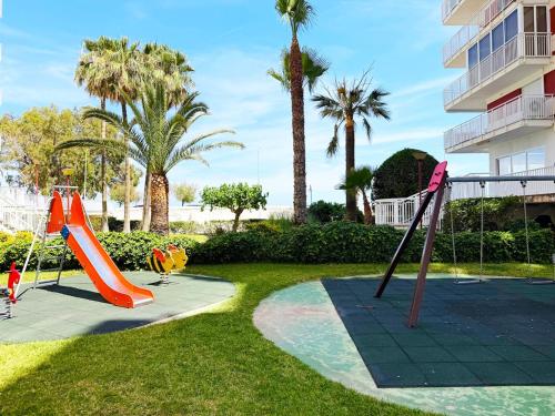 a park with a playground with an slide at BeniforniaLove in Benicàssim