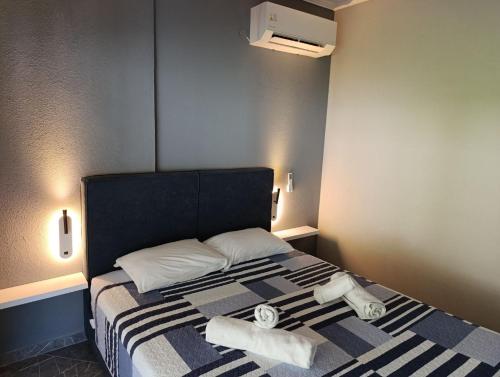 Postel nebo postele na pokoji v ubytování Sountou home