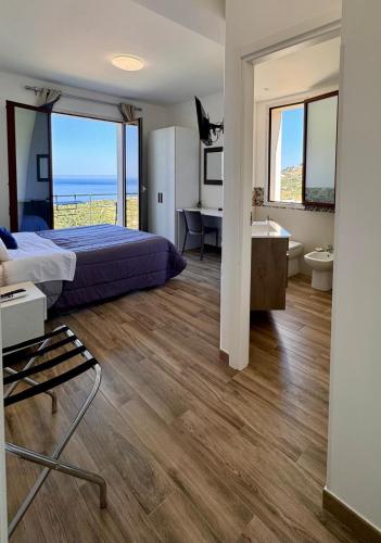 Ένα ή περισσότερα κρεβάτια σε δωμάτιο στο Bed and Breakfast Stella del Sud Makari