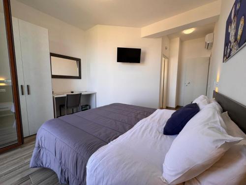 Ένα ή περισσότερα κρεβάτια σε δωμάτιο στο Bed and Breakfast Stella del Sud Makari