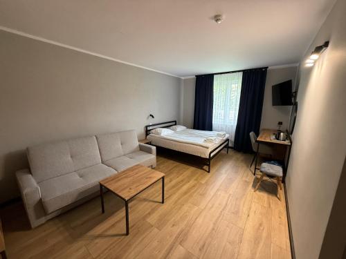 Postel nebo postele na pokoji v ubytování Hotel Kliper