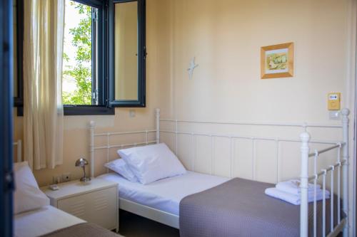 Postel nebo postele na pokoji v ubytování Serenata
