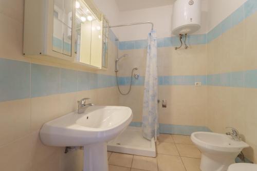 Koupelna v ubytování Appartamenti Le Miniere 2 e 3 - Goelba