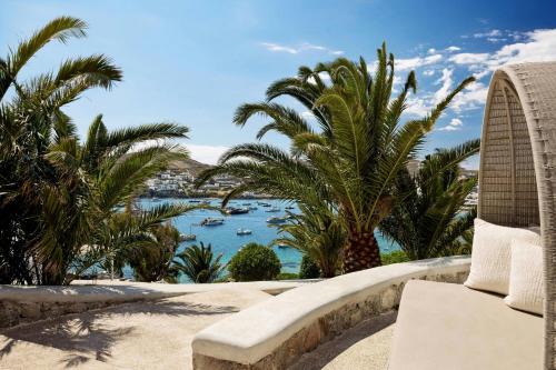 a view of the ocean from a resort patio at Santa Marina, A Luxury Collection Resort, Mykonos in Ornos