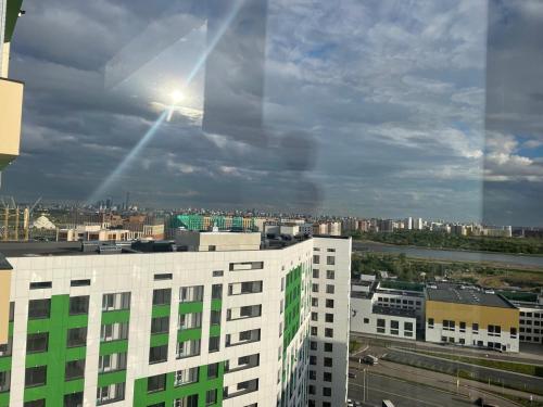 a view of a city from a building at АК Апартамент in Kirovo