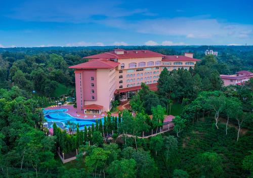 an aerial view of a resort with a pool at Grand Sultan Tea Resort & Golf in Sreemangal