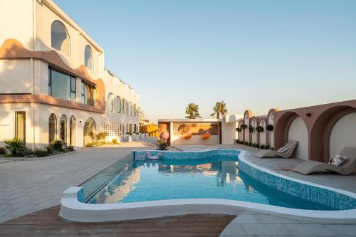 a swimming pool in the middle of a building at Shanghai -Creek -Camping -BBQ -Parent-child- Homestay in Shanghai