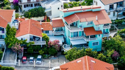 an overhead view of houses with orange roofs at Apartments Katarine Zrinske in Vodice