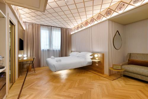 Postel nebo postele na pokoji v ubytování QC room Milano Porta Romana