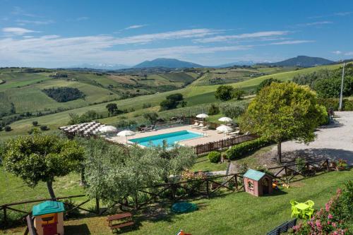 an aerial view of a villa with a swimming pool at La Rosa & La Viola in Carassai