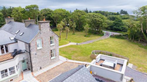 an aerial view of a house with a large yard at Tobervilla Guest House in Caherdaniel