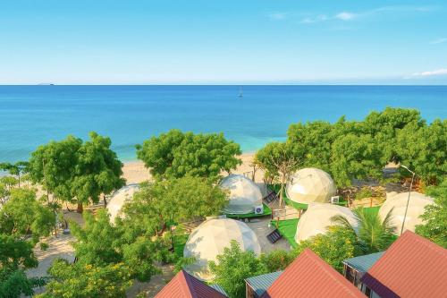 an overhead view of domes at a camp near the beach at Vietnam Surf Camp in Ấp Mỹ Hải