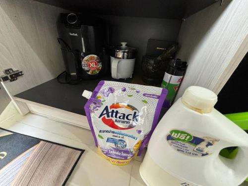 a jug of milk and a carton ofadobeadobeadobeadobeadobeadobeadobe at Nich Mono Ramkhumheng Low Rise in Sathani Ban Hua Mak