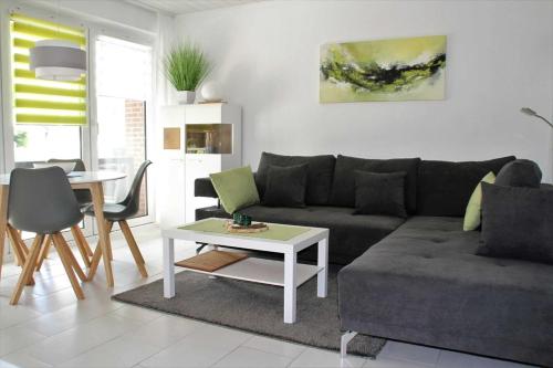 Χώρος καθιστικού στο Ferienwohnung Deichkrone