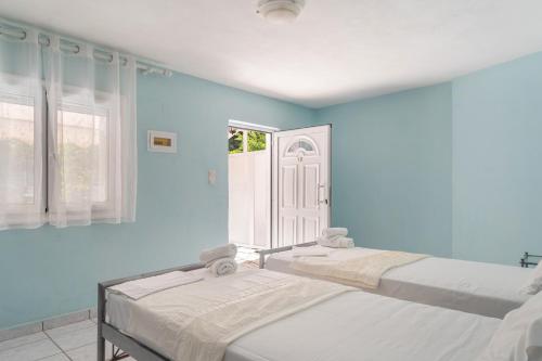 Ένα ή περισσότερα κρεβάτια σε δωμάτιο στο Giorgio studios-apartments 1