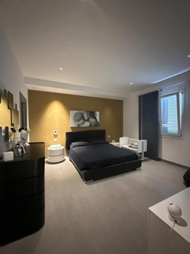 En eller flere senge i et værelse på Residenza Panama