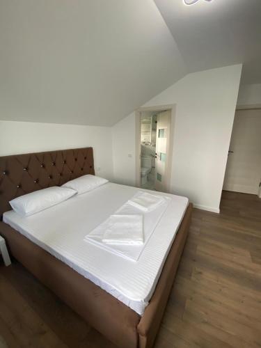 Ένα ή περισσότερα κρεβάτια σε δωμάτιο στο Casa Miru
