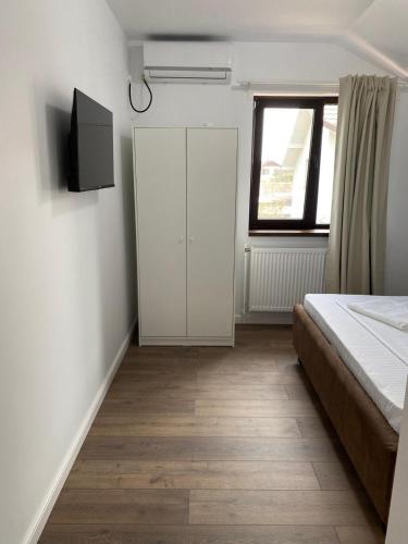 Ένα ή περισσότερα κρεβάτια σε δωμάτιο στο Casa Miru