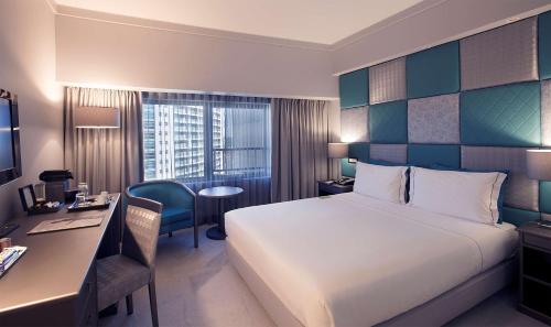 Un ou plusieurs lits dans un hébergement de l'établissement Tivoli Oriente Lisboa Hotel