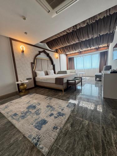 Ένα ή περισσότερα κρεβάτια σε δωμάτιο στο Ween Otel