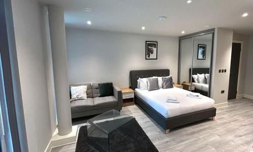 Ένα ή περισσότερα κρεβάτια σε δωμάτιο στο Chic Studio in Bracknell at convenient location
