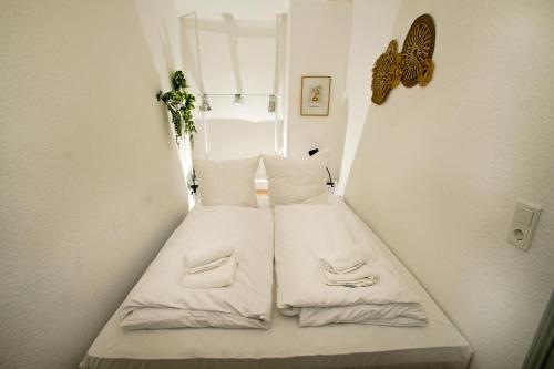 Ένα ή περισσότερα κρεβάτια σε δωμάτιο στο THEFIVE60 Apartments