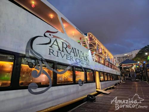 a train is parked at a train station at Riverine Diamond Condominium at City Centre in Kuching