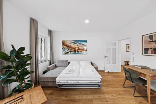 Postel nebo postele na pokoji v ubytování Vaicun Stays LUXURY APARTMENTS - Stilvolle Apartments am Tegernsee