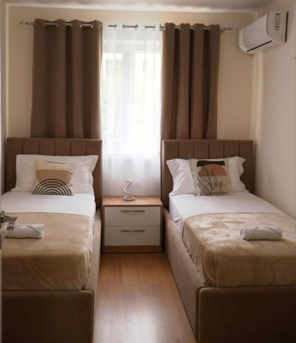 Krevet ili kreveti u jedinici u objektu Fiora Apartment