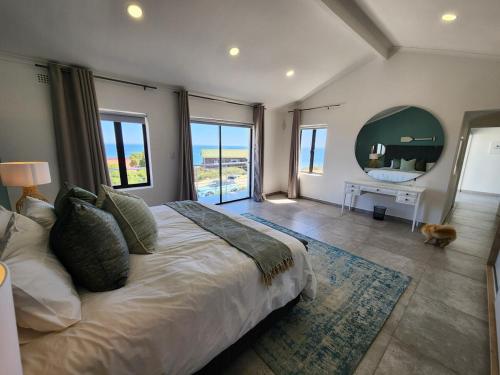 Postel nebo postele na pokoji v ubytování House Déjá View Seaside Holiday home