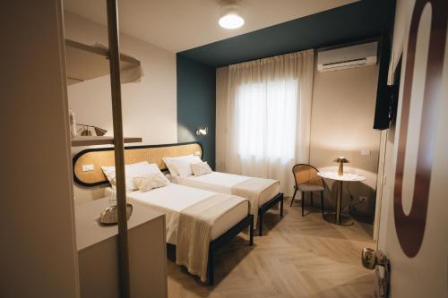 Ένα ή περισσότερα κρεβάτια σε δωμάτιο στο Presentosa