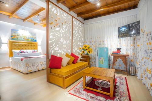 Ένα ή περισσότερα κρεβάτια σε δωμάτιο στο Bellwood Cottages - Tea Cabins