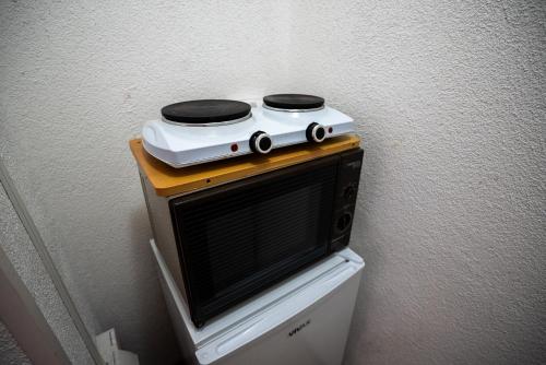 Ilidža Garden Escapeにあるテレビまたはエンターテインメントセンター