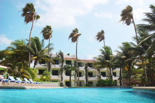a view of the resort from the pool at Hotel Club Akumal Caribe in Akumal