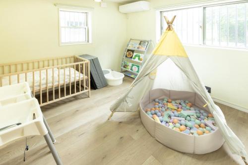 Gambar di galeri bagi 1日1組限定の3階建て貸切宿 AIRSTAR Second di Fukuoka
