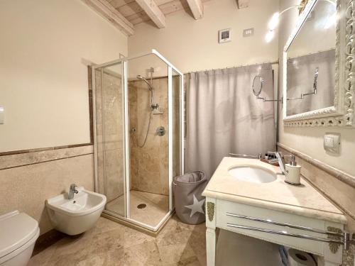 Phòng tắm tại Loft Abbazia