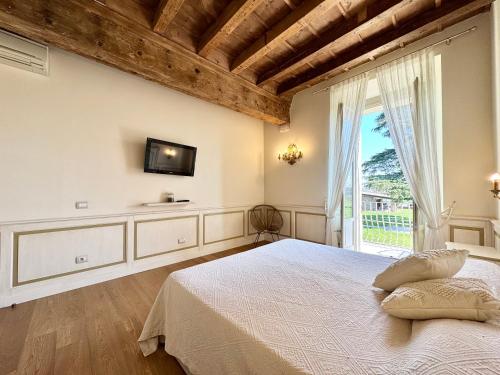 Giường trong phòng chung tại Loft Abbazia