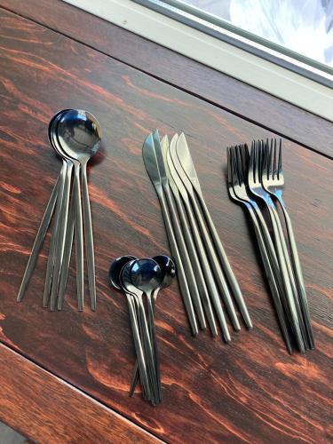 a group of forks and spoons on a table at Vacation Village Okinawa - Nakijin in Nakijin