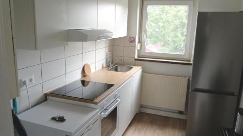 Η κουζίνα ή μικρή κουζίνα στο Lumini Apartments