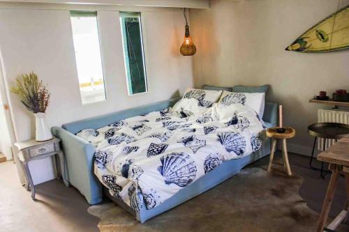 Ένα ή περισσότερα κρεβάτια σε δωμάτιο στο Het Logement in Zierikzee