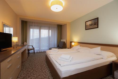 Postel nebo postele na pokoji v ubytování Hotel Green