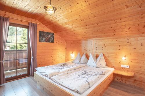 Posteľ alebo postele v izbe v ubytovaní Wilderer Alm Chalet Katschberg