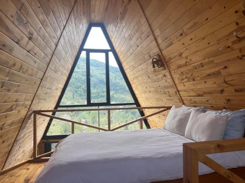 Ένα ή περισσότερα κρεβάτια σε δωμάτιο στο İrem bungalov