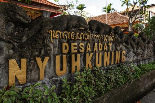 a sign at the entrance to the new istg at Eiwa House in Ubud
