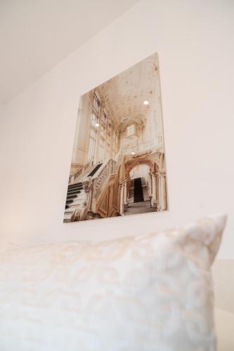 a picture of a staircase in a building with a pillow at La Corte di Partenope Luxury Suite in Naples