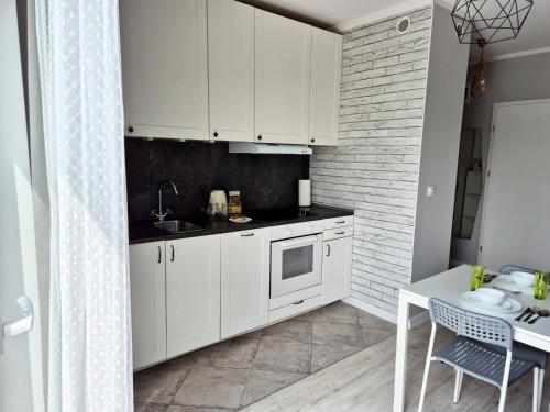 Η κουζίνα ή μικρή κουζίνα στο Apart 36