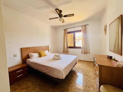 En eller flere senge i et værelse på Casa Monkeys by Rental Hero