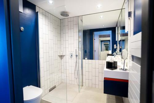 Koupelna v ubytování GREFIS Hotel